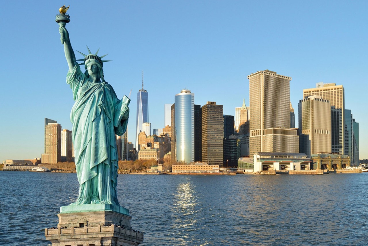 Statue of Liberty and Manhattah skyline.